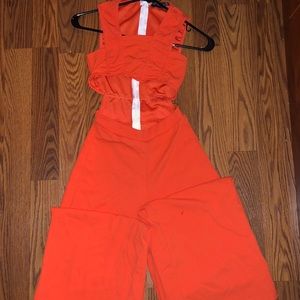 Orange cut out jumpsuit.